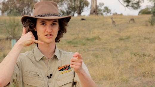 Stuart McMillen as Macca with Akubra hat and khaki shirt during Aussie crowdfunding video