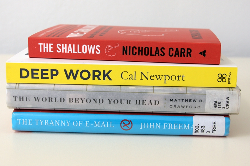 Pile of books about concentration, productivity, and distraction