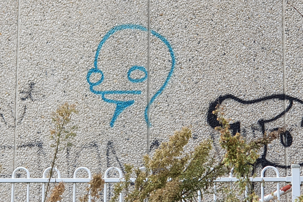 Spray painted alien on wall in Canberra