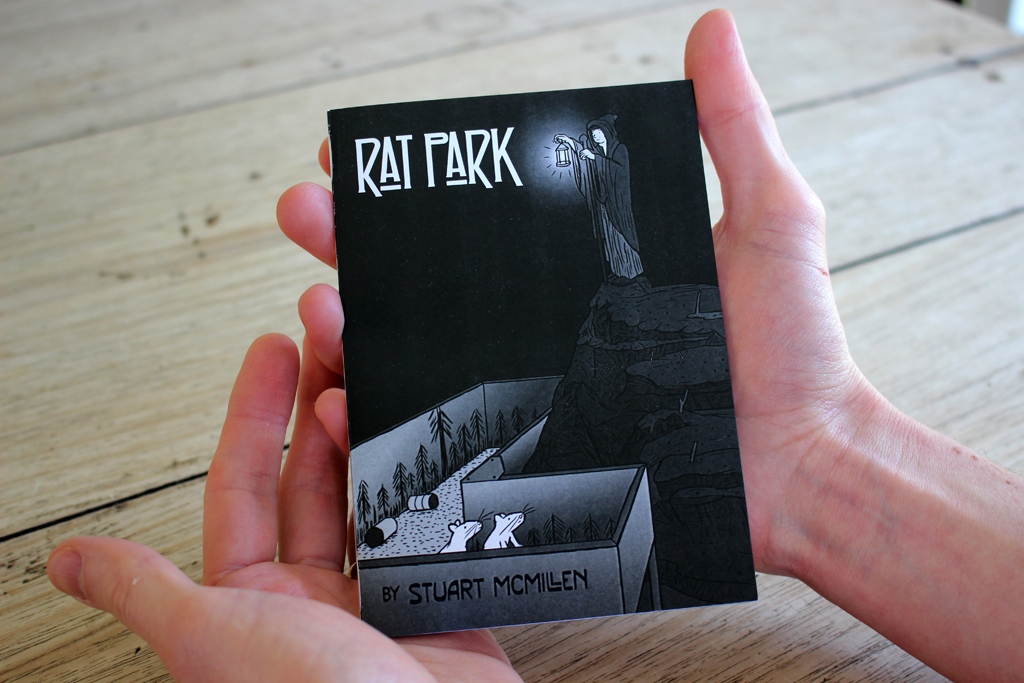 Rat Park comic book being held in hands, demonstrating the A6 size