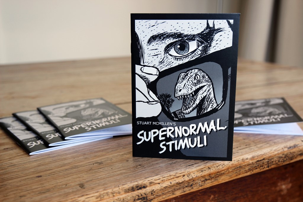 Supernormal Stimuli comic book displayed on a table